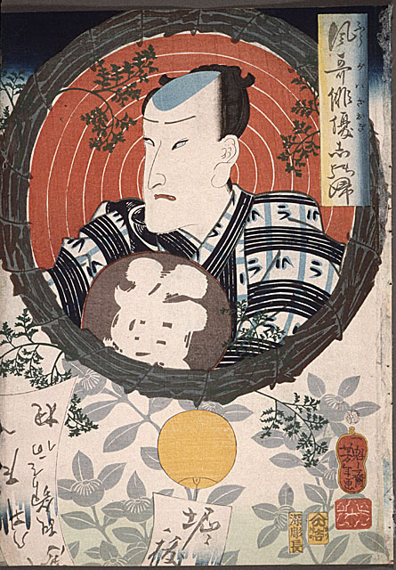 Ichimura Kakitsu holding inscribed fan.